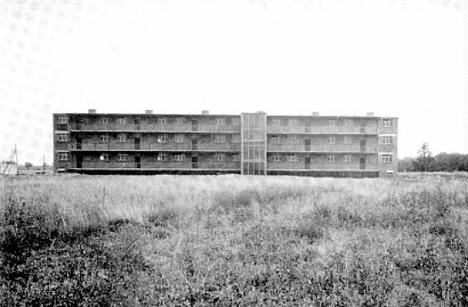 Erweiterung der Siedlung Dessau-Törten, Laubenganghaus, Entwurf: Hannes Meyer und Bauabteilung Bauhaus Dessau, 1929–30.