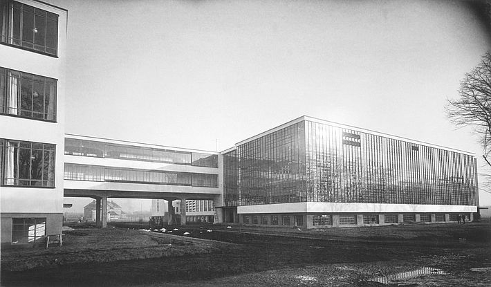 Bauhaus building Dessau from north-west, architecture: Walter Gropius / photo: Lucia Moholy, 1926.